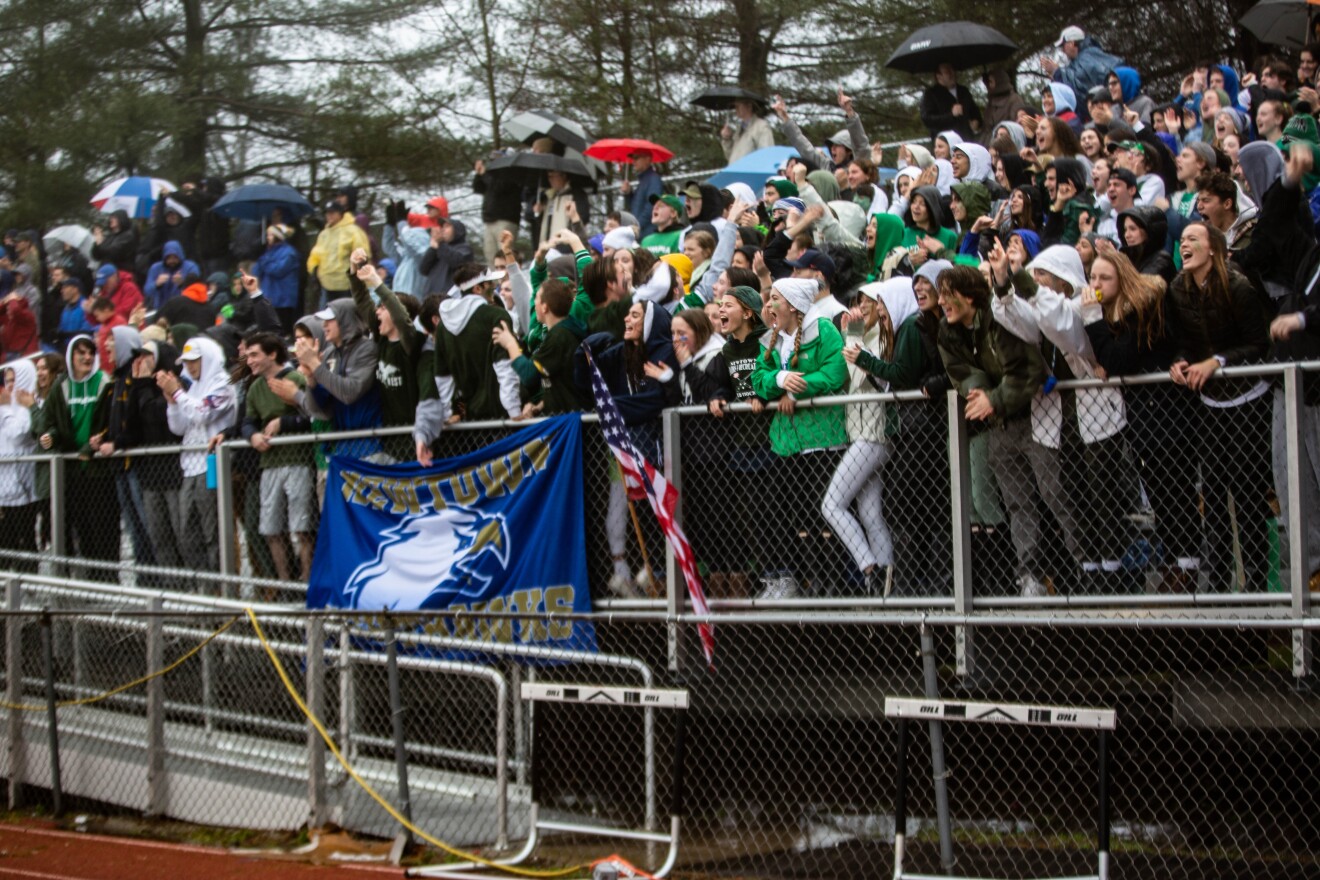 Many fans in Newtown's student section wore green, one of Sandy Hook Elementary School's colors.